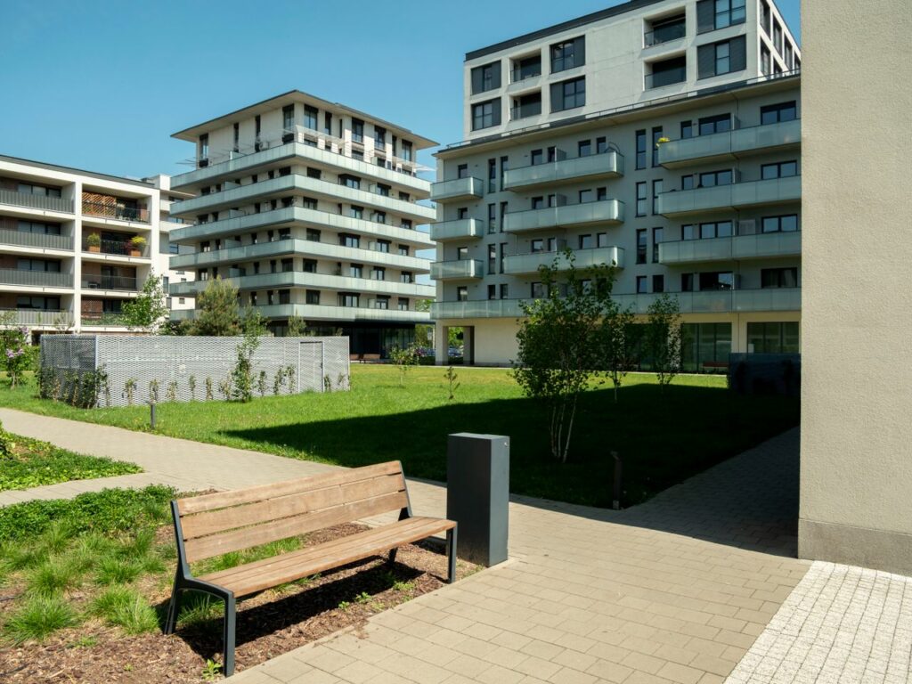 pexels-photo-37528618 Contemporary apartment buildings with green spaces in Wrocław, Poland.